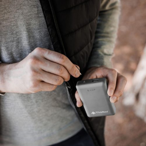 THAW, fűthető ülőpárna akkumulátor pakkal, fekete-narancs